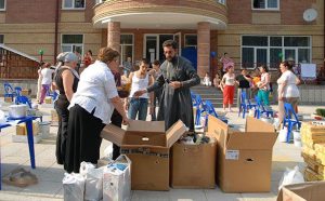 2008 | Georgia - IOCC volunteers distributing emergency supplies to displaced people