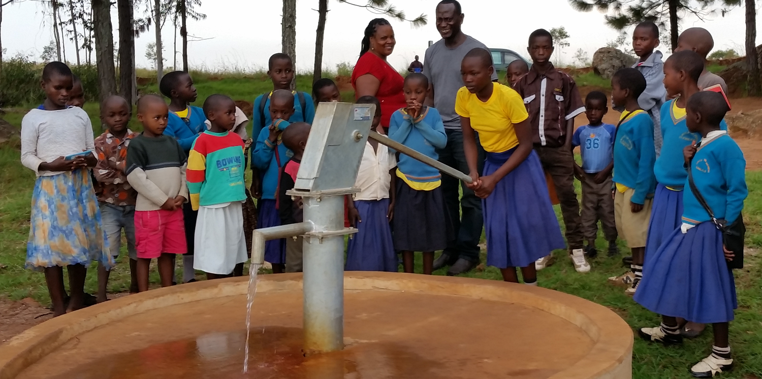 Child pumping water