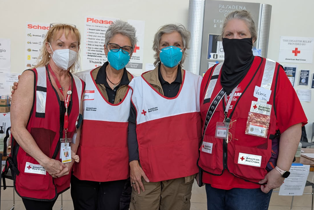 Two IOCC Frontliners, Kathy Hallas and Eleni Fredlund (pictured center), provided ESC to wildfire survivors at a Red Cross Shelter in Pasadena, CA.